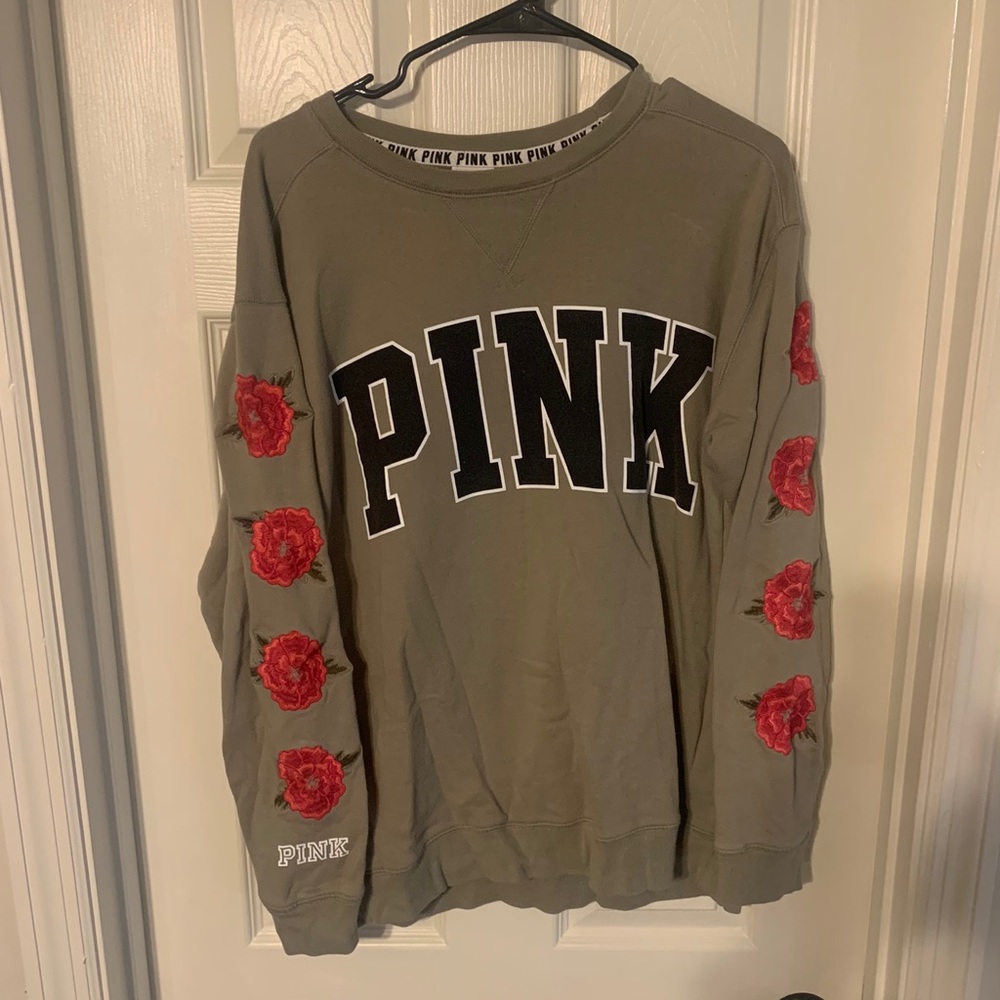 Victoria’s Secret sweatshirt.